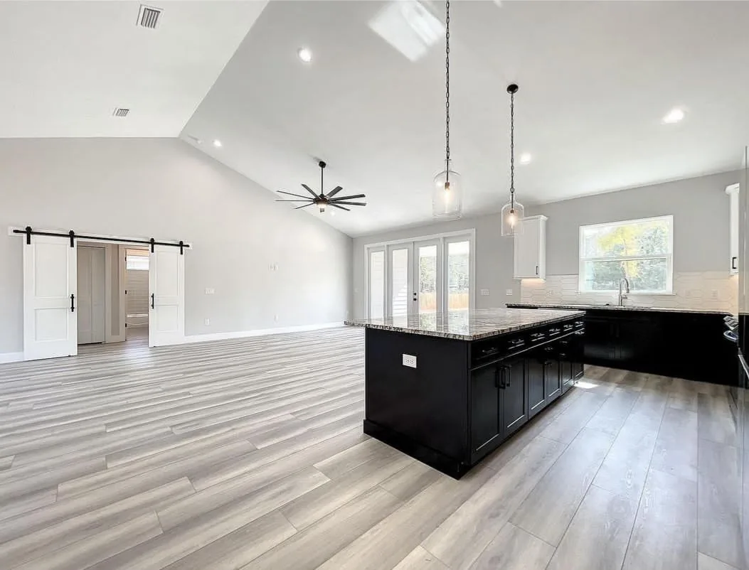 Vaulted great-room lighting in a new build